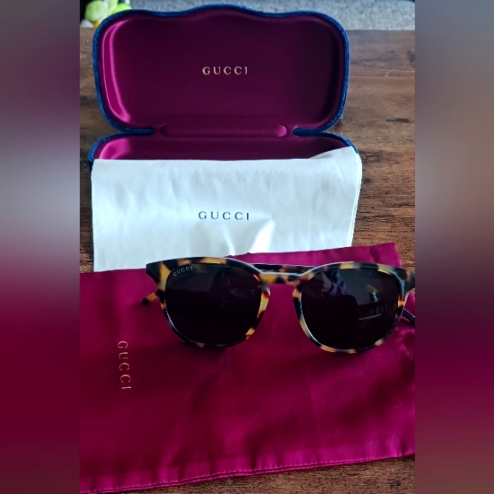 Gucci Sunglasses with accessories